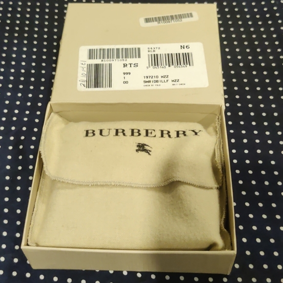 Used Burberry Wallet With all tags and box. - Picture 15 of 15